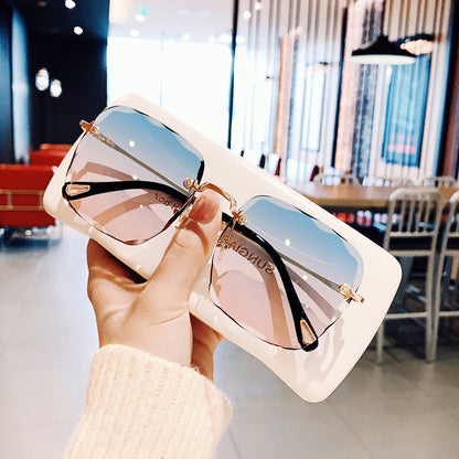 High Quality Fashion Women's Rimless Trimmed Square Sunglasses