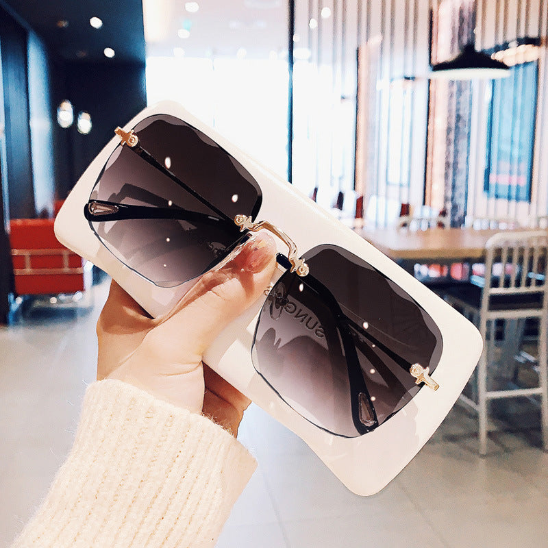 High Quality Fashion Women's Rimless Trimmed Square Sunglasses